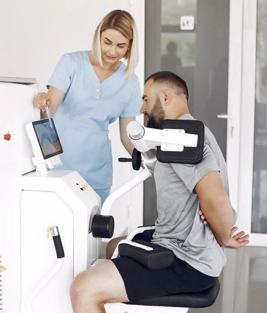 Dr. Rubeena Yadgar, Neurophysiotherapist in Bangalore, assisting patient with shoulder mobility therapy
